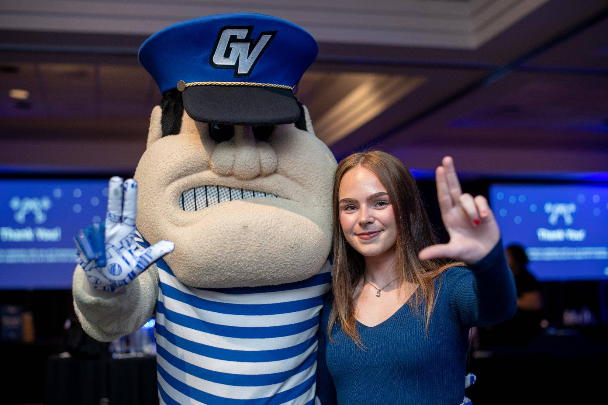 louie and student holding up anchor up